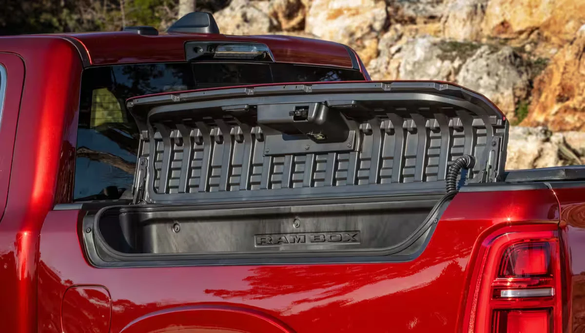 2026 RAM 1500 truck bed storage with tailgate open highlighting payload and hauling features near Johnson City, TN